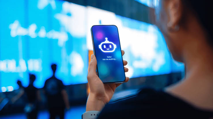 Person holding phone with chatbot app